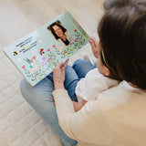 Grandma reading Peek-A-Photo book to baby